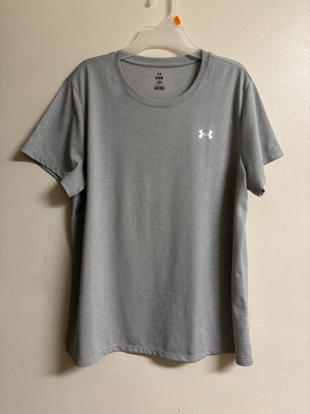Under Armour women Light Gray Short Sleeve Performance Tee
